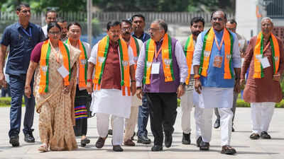 BJP national president and MP Nitin Nabin, front second left, with party leaders Tarun Chugh, second right, Rekha Verma, left, Harsh Malhotra, behind centre, and others 'Grassroots outreach, youth connect': BJP sharpens poll strategy for 7 states