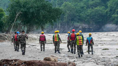 Rescue teams search for survivors in flood-hit areas of Nepal as authorities seek international assistance Nepal floods: Kathmandu agrees to foreign rescue help after pressure; India acts on its 'request'