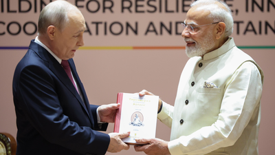 Prime Minister Narendra Modi meets Russian President Putin in New Delhi. Brics summit: PM Modi gifts Putin Russian translation of Thirukkural