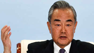 Chinese Foreign Minister Wang Yi Chinese FM Wang Yi stepped in for Xi at PM Modi’s Brics gala dinner: Reports