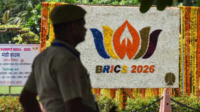File photo: A police official stands guard near a floral installation of the Brics logo during the 18th BRICS Summit, in New Delhi. (PTI Photo) Delhi Police recover Brics delegate’s cash-filled bag from cab in 35 minutes