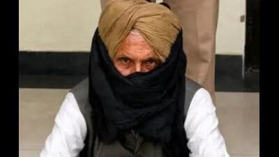 Saudagar Singh, the father of late singer Sidhu Moosewala’s former associate Shaganpreet Singh, in Barnala police custody on Saturday. (HT Photo) Saudagar Singh, the father of late singer Sidhu Moosewala’s former associate Shaganpreet Singh, in Barnala police custody on Saturday. (HT Photo)