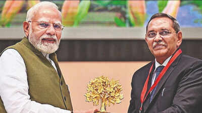 PM Modi being presented a memento during ‘The Future of Environment and Climate Dynamics’, at Vigyan Bhawan, in New Delhi Saturday PM Modi pushes back on West’s narrative over carbon emissions