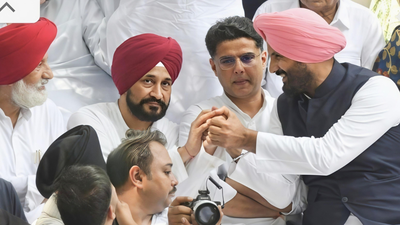 Sachin Pilot with Charanjit Singh Channi and Amrinder Singh Raja Warring during a protest to demand justice for the late Gulzar Singh in Chandigarh on Tuesday. Smooth take off: Pilot handles Punjab turbulence with ‘no CM face’ formula; but can he carry Congress beyond winning line?