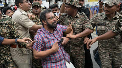 Police detainingJohn Brittas during the protest 'Can't intimidate democracy': CPM MP John Brittas writes to CJI, President & RS chair over Delhi police 'assault'