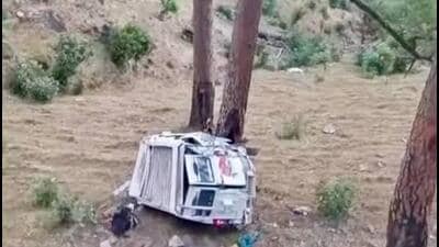 The mangled remains of the cab after it skidded off the road in the Dandal area of Reasi district on Wednesday night. (HT Photo) The mangled remains of the cab after it skidded off the road in the Dandal area of Reasi district on Wednesday night. (HT Photo)